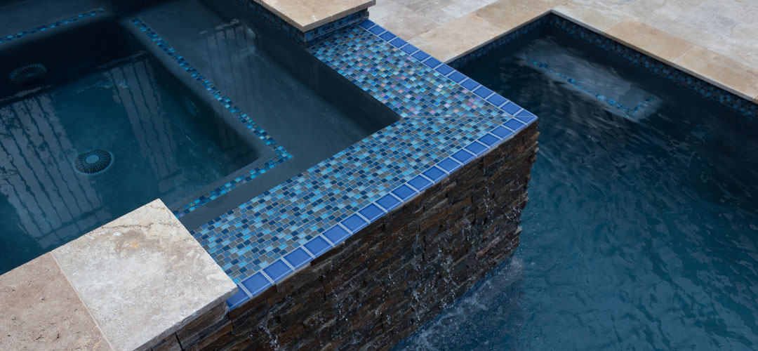 NPT Jules Rustic Blue Blend Waterline Tile on Spa and Swimming Pool